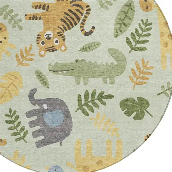 8' Mint Green And Ivory Round Abstract Washable Indoor Outdoor Area Rug Photo 2