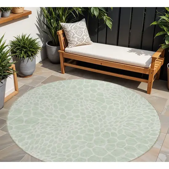8' Mint Green And Ivory Round Geometric Washable Indoor Outdoor Area Rug Photo 1