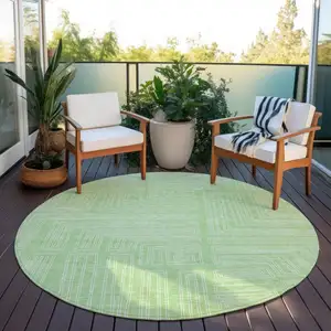 Photo of 8' Mint Green And Ivory Round Geometric Washable Indoor Outdoor Area Rug