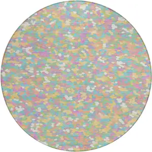 Photo of 8' Mint Green And Ivory Round Geometric Washable Indoor Outdoor Area Rug