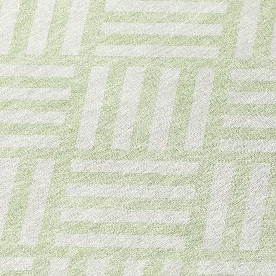 8' Mint Green And Ivory Round Geometric Washable Indoor Outdoor Area Rug Photo 7