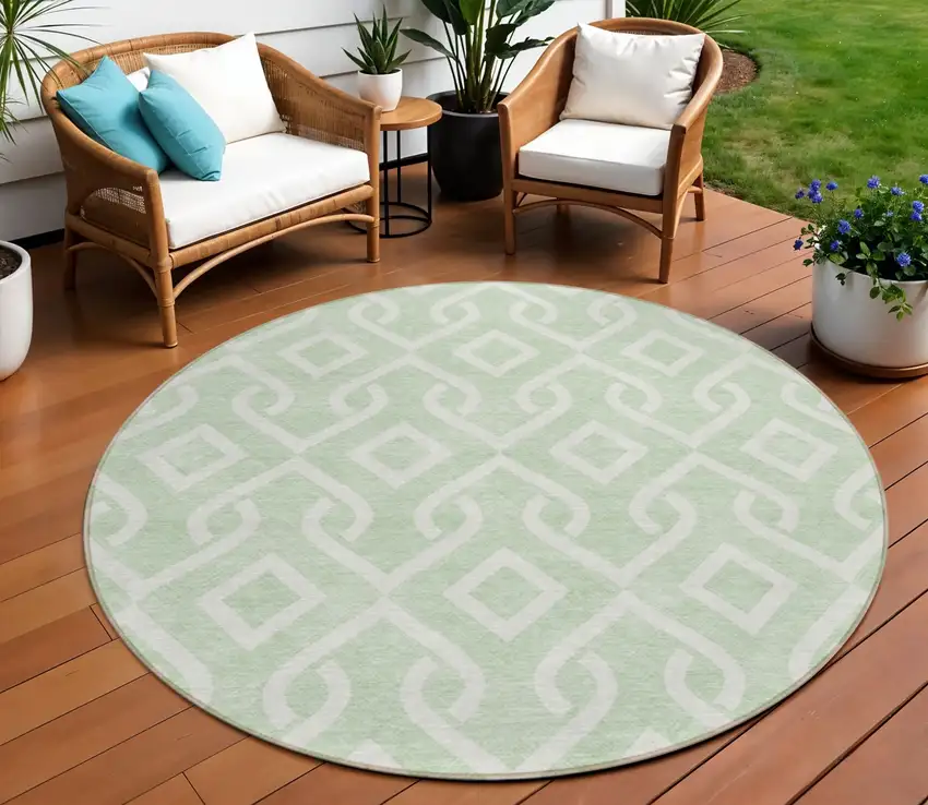 8' Mint Green And Ivory Round Geometric Washable Indoor Outdoor Area Rug Photo 1