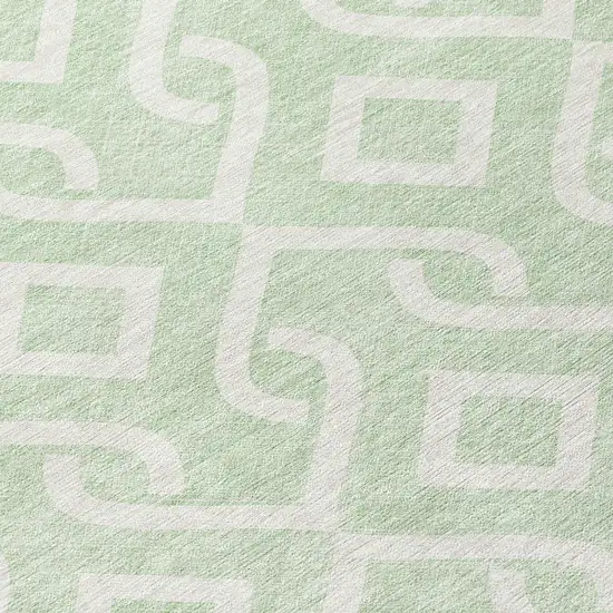 8' Mint Green And Ivory Round Geometric Washable Indoor Outdoor Area Rug Photo 4