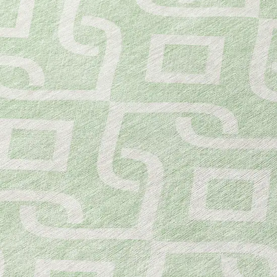8' Mint Green And Ivory Round Geometric Washable Indoor Outdoor Area Rug Photo 4