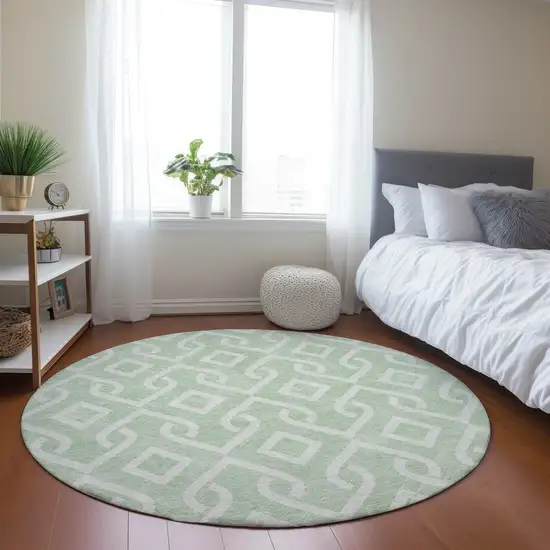 8' Mint Green And Ivory Round Geometric Washable Indoor Outdoor Area Rug Photo 8