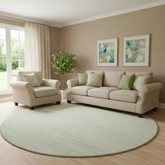 8' Mint Green And Ivory Striped Washable Round Rug With UV Protection Photo 1