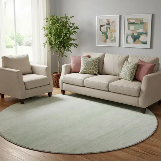 8' Mint Green And Ivory Striped Washable Round Rug With UV Protection Photo 1