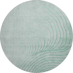 Photo of 8' Mint Green And Silver Abstract Washable Round Rug With UV Protection