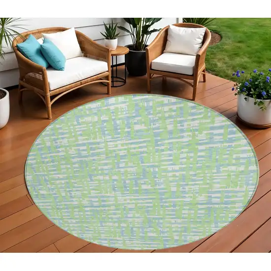 8' Mint Green Blue And Beige Round Abstract Washable Indoor Outdoor Area Rug Photo 1