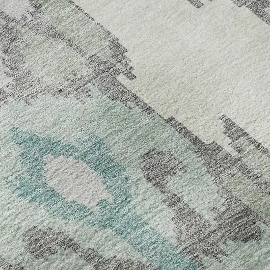 8' Mint Green Blue And Ivory Ikat Washable Round Rug With UV Protection Photo 9