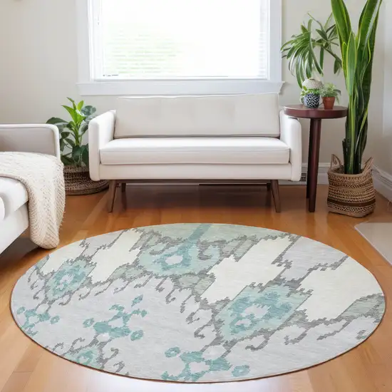 8' Mint Green Blue And Ivory Ikat Washable Round Rug With UV Protection Photo 5
