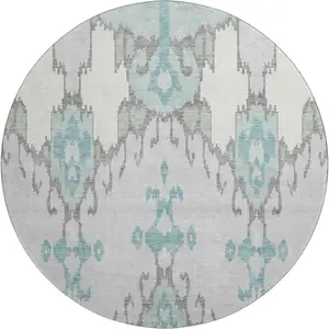Photo of 8' Mint Green Blue And Ivory Ikat Washable Round Rug With UV Protection