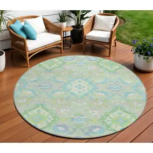 Photo of 8' Mint Green Blue And Ivory Round Oriental Washable Indoor Outdoor Area Rug