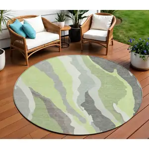 Photo of 8' Mint Green Gray And Charcoal Round Abstract Washable Indoor Outdoor Area Rug