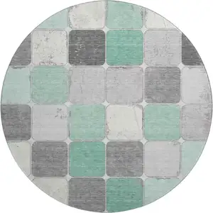 Photo of 8' Mint Green Ivory And Gray Geometric Washable Round Rug With UV Protection