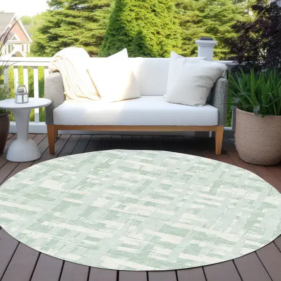 8' Mint Green Ivory And Pale Aqua Round Striped Washable Indoor Outdoor Area Rug Photo 5