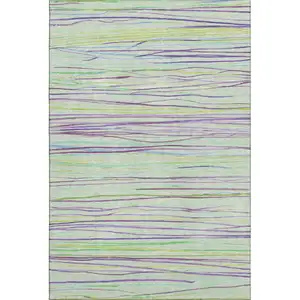 Photo of 8' Mint Green Lavender And Lime Green Striped Washable Area Rug With UV Protection