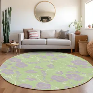 Photo of 8' Mint Green Purple And Ivory Round Floral Washable Indoor Outdoor Area Rug