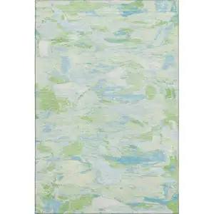 Photo of 8' Mint Green Sky Blue And Ivory Abstract Washable Area Rug With UV Protection
