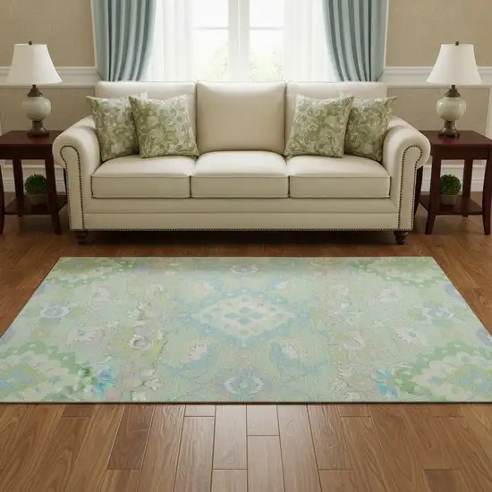 8' Mint Green Teal And Lavender Oriental Washable Round Rug With UV Protection Photo 2