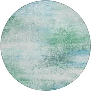 Photo of 8' Mint Green Teal Blue And Ivory Round Abstract Washable Indoor Outdoor Area Rug