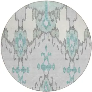 Photo of 8' Mint Green Teal Blue And Ivory Round Ikat Washable Indoor Outdoor Area Rug