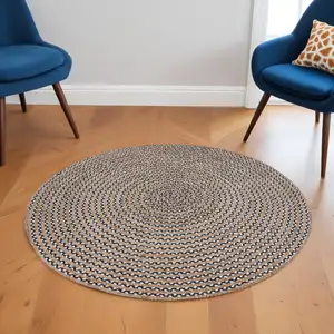Photo of 6' Natural And Black Jute Vermicular Hand Woven Round Rug
