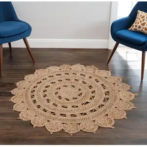 Photo of 6' Natural Jute Floral Medallion Hand Braided Round Rug