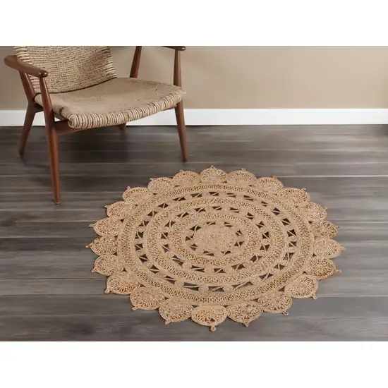 4' Natural Jute Floral Medallion Hand Braided Round Rug Photo 1