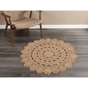 Photo of 4' Natural Jute Floral Medallion Hand Braided Round Rug