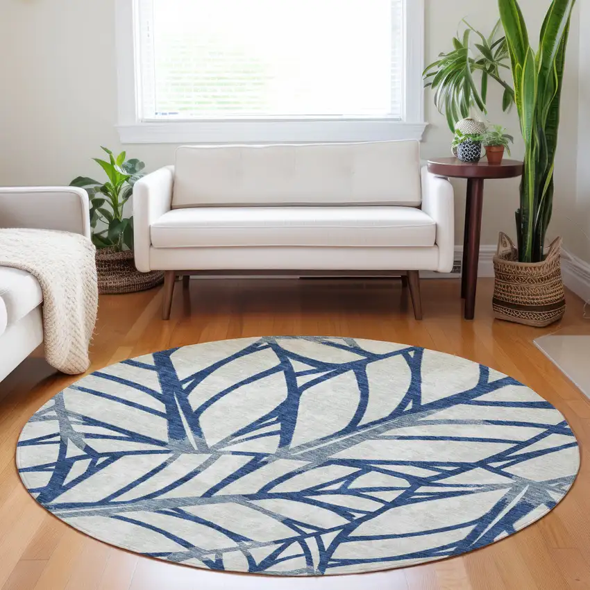 8' Navy Blue And Beige Floral Washable Round Rug With UV Protection Photo 5