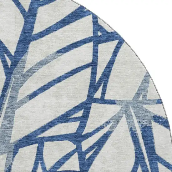 8' Navy Blue And Beige Floral Washable Round Rug With UV Protection Photo 4