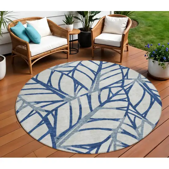 8' Navy Blue And Beige Round Floral Washable Indoor Outdoor Area Rug Photo 1