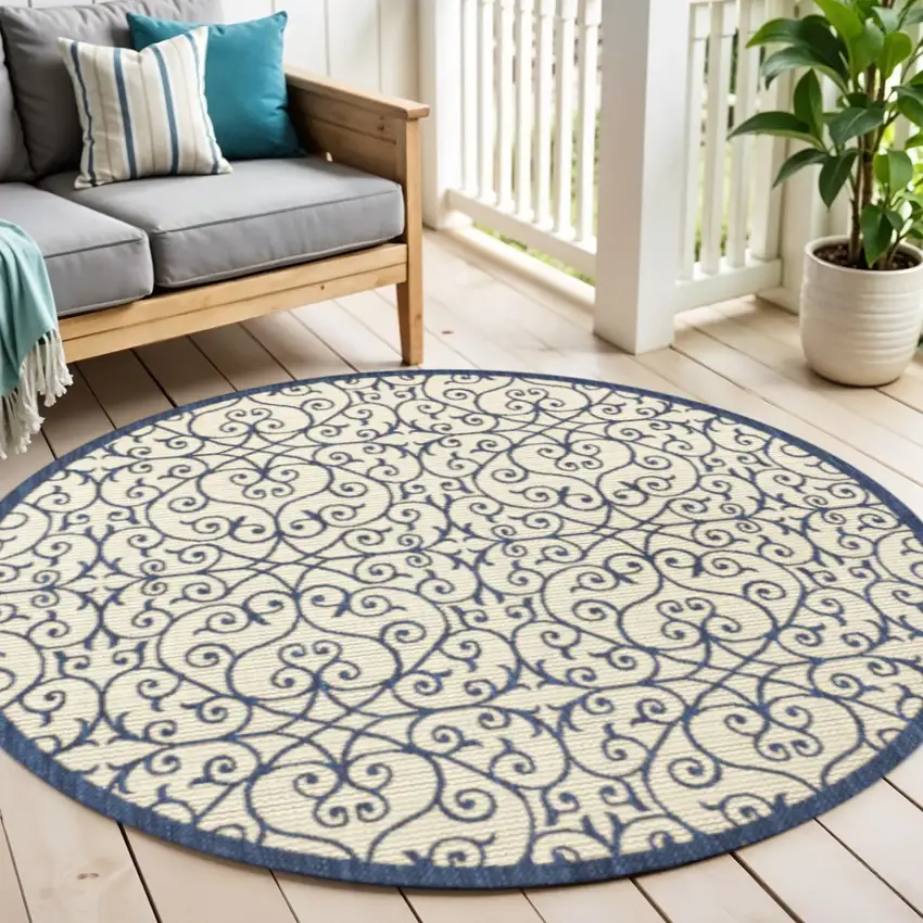 5' Navy Blue And Beige Round Geometric Indoor Outdoor Area Rug Photo 1