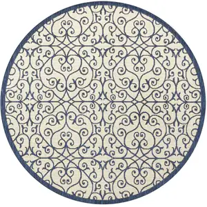 Photo of 5' Navy Blue And Beige Round Geometric Indoor Outdoor Area Rug