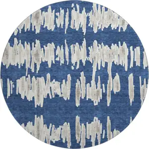 Photo of 8' Navy Blue And Beige Striped Washable Round Rug With UV Protection