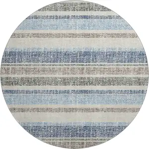 Photo of 8' Navy Blue And Beige Striped Washable Round Rug With UV Protection