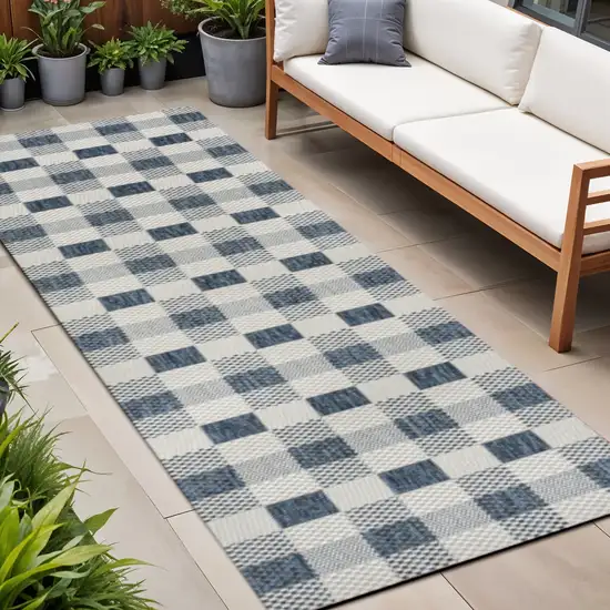 8' Navy Blue And Cream Geometric Indoor Outdoor Runner Rug Photo 1
