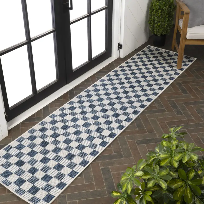 8' Navy Blue And Cream Geometric Indoor Outdoor Runner Rug Photo 5
