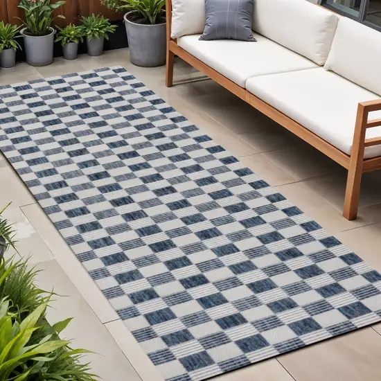 8' Navy Blue And Cream Geometric Indoor Outdoor Runner Rug Photo 1