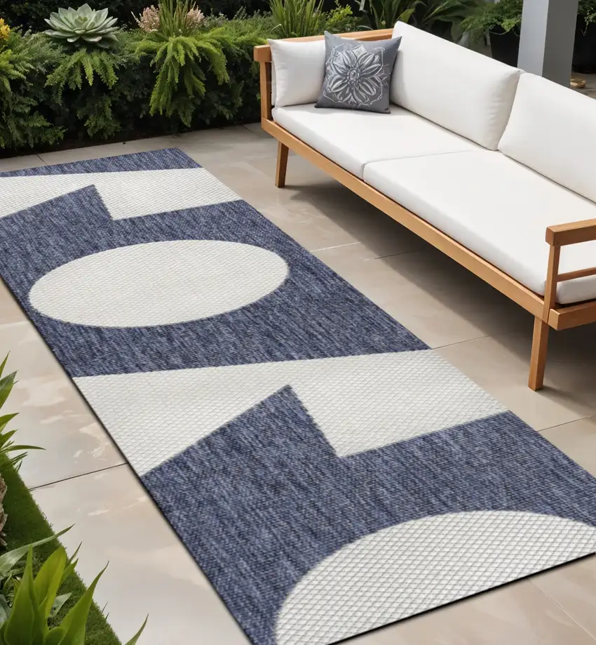 8' Navy Blue And Cream Geometric Indoor Outdoor Runner Rug Photo 1