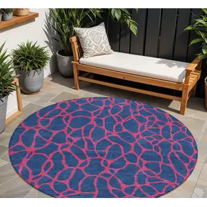 Photo of 8' Navy Blue And Dark Pink Round Geometric Washable Indoor Outdoor Area Rug