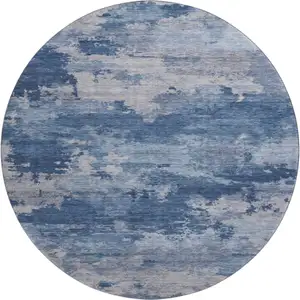 Photo of 8' Navy Blue And Denim Blue Abstract Washable Round Rug With UV Protection