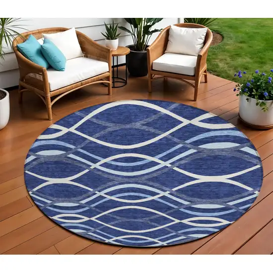 8' Navy Blue And Denim Blue Round Abstract Washable Indoor Outdoor Area Rug Photo 1