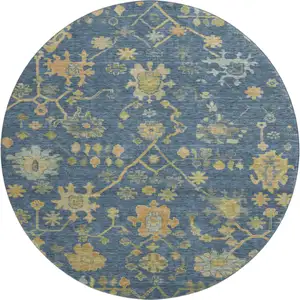Photo of 8' Navy Blue And Gold Floral Washable Round Rug With UV Protection