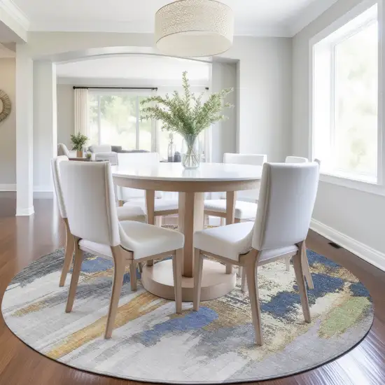 8' Navy Blue And Gold Round Abstract Washable Indoor Outdoor Area Rug Photo 5