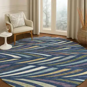 Photo of 8' Navy Blue And Gold Round Abstract Washable Indoor Outdoor Area Rug
