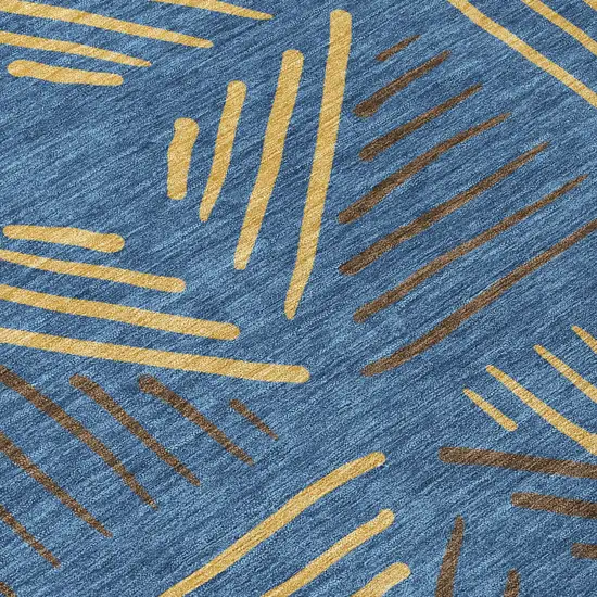 8' Navy Blue And Gold Round Geometric Washable Indoor Outdoor Area Rug Photo 9