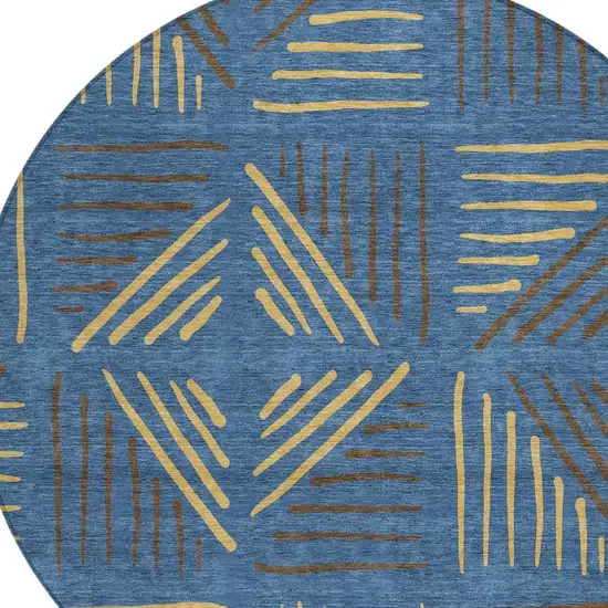 8' Navy Blue And Gold Round Geometric Washable Indoor Outdoor Area Rug Photo 2