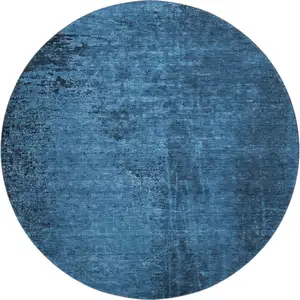 Photo of 8' Navy Blue And Gray Abstract Washable Round Rug With UV Protection